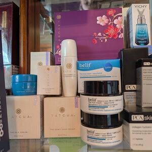 Tatcha Dewy Skin Cream Display with Purple and White Accents